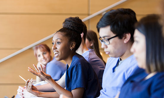 Medical school student asks question during class